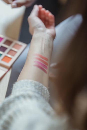 Lipstick shades being swatched on skin